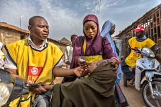 Health workers and volunteers participate in a door-to-door polio immunization campaign in Kaduna, Nigeria. 13 April 2019. Rotary International is working closely with the government of Nigeria and its GPEI partners to intensify polio-eradication efforts there by addressing cultural barriers, fostering community education, and increasing surveillance in a mobile population.