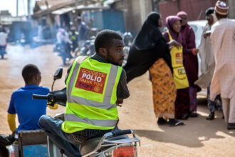 Health workers and volunteers participate in a door-to-door polio immunization campaign in Kaduna, Nigeria. 13 April 2019. Rotary International is working closely with the government of Nigeria and its GPEI partners to intensify polio-eradication efforts there by addressing cultural barriers, fostering community education, and increasing surveillance in a mobile population.